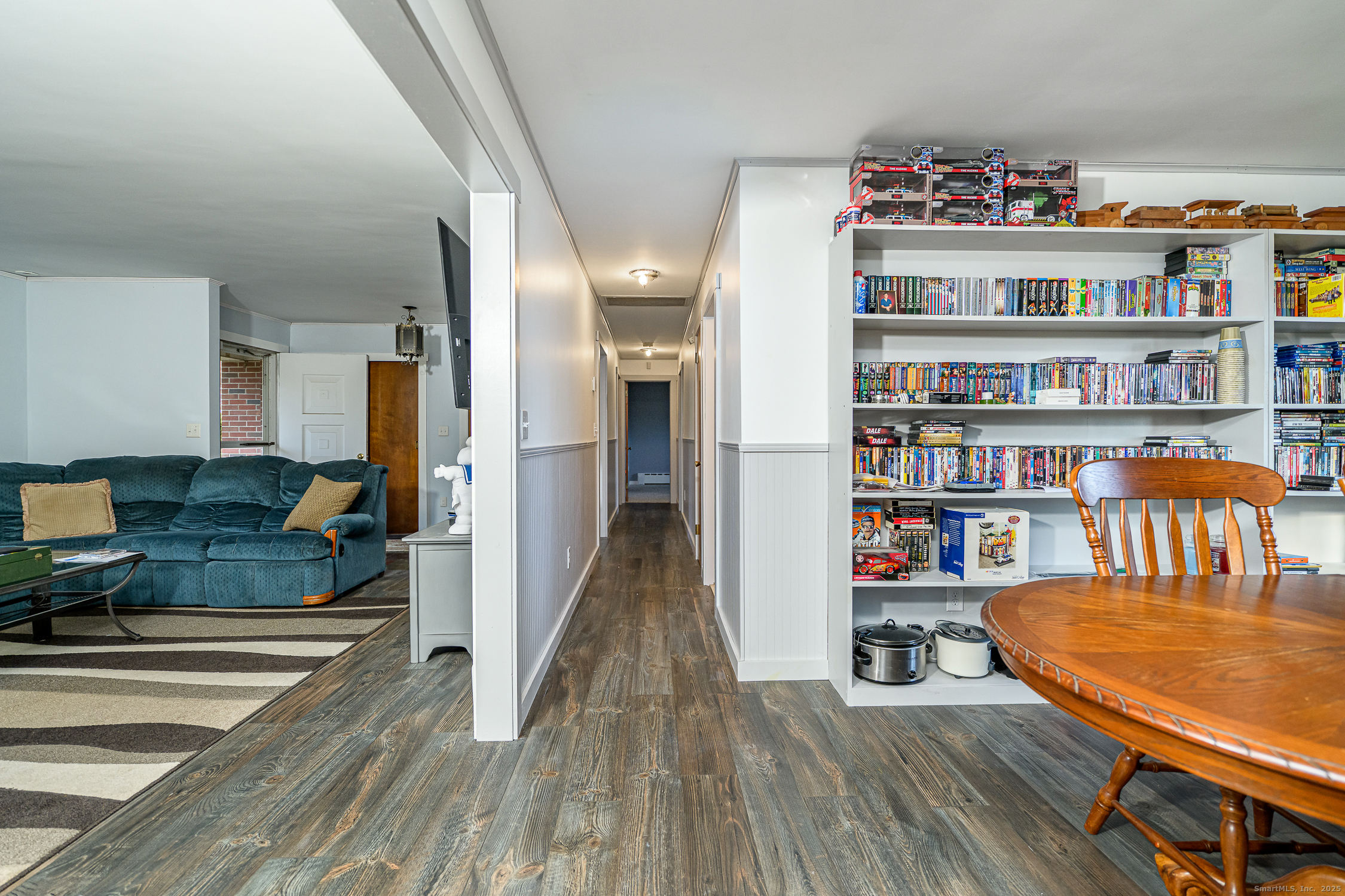1436 North Road Killingly, CT 06241 - Photo 22 of 36 a view of a living room and shelves
