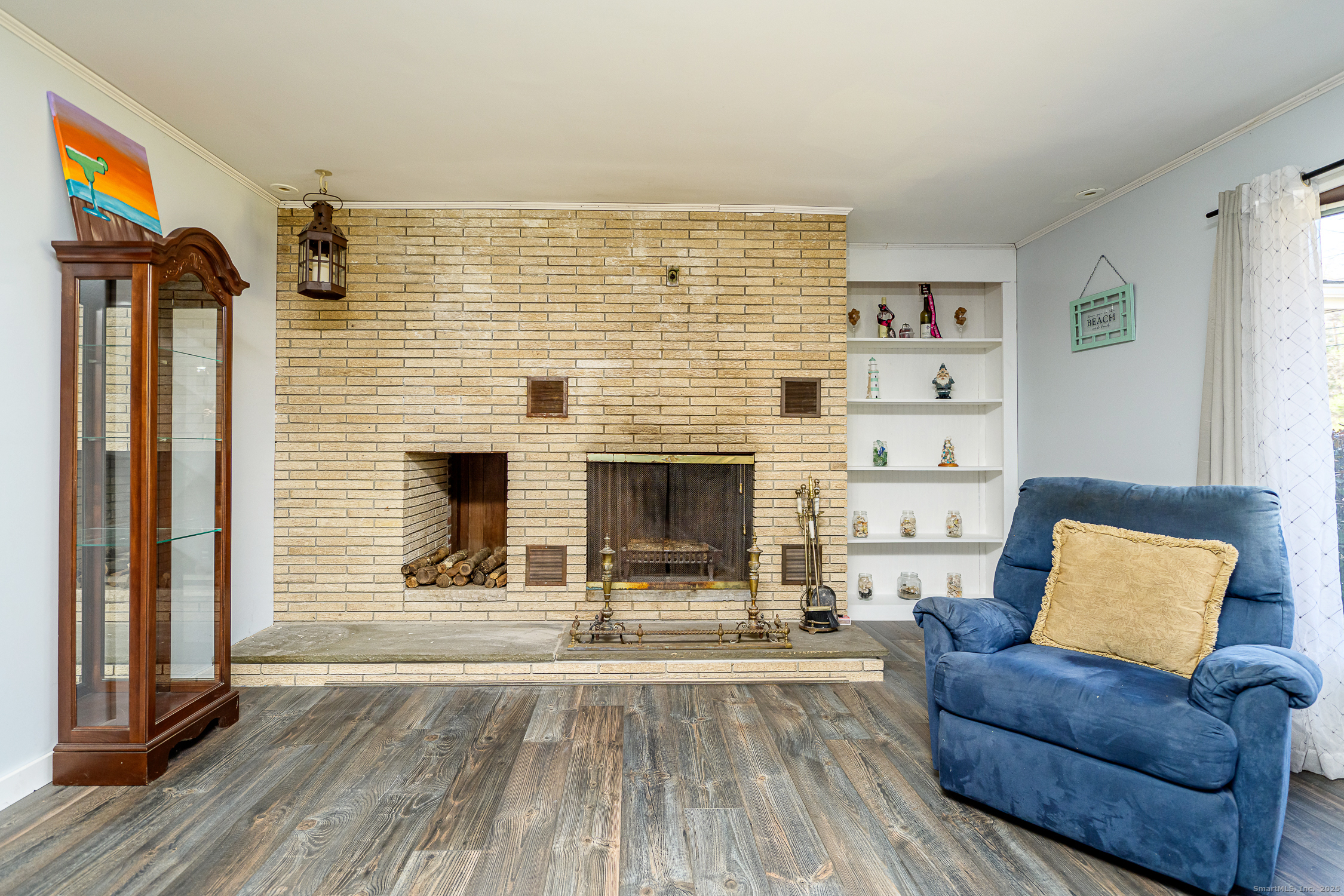1436 North Road Killingly, CT 06241 - Photo 6 of 36 a living room with furniture and a fireplace