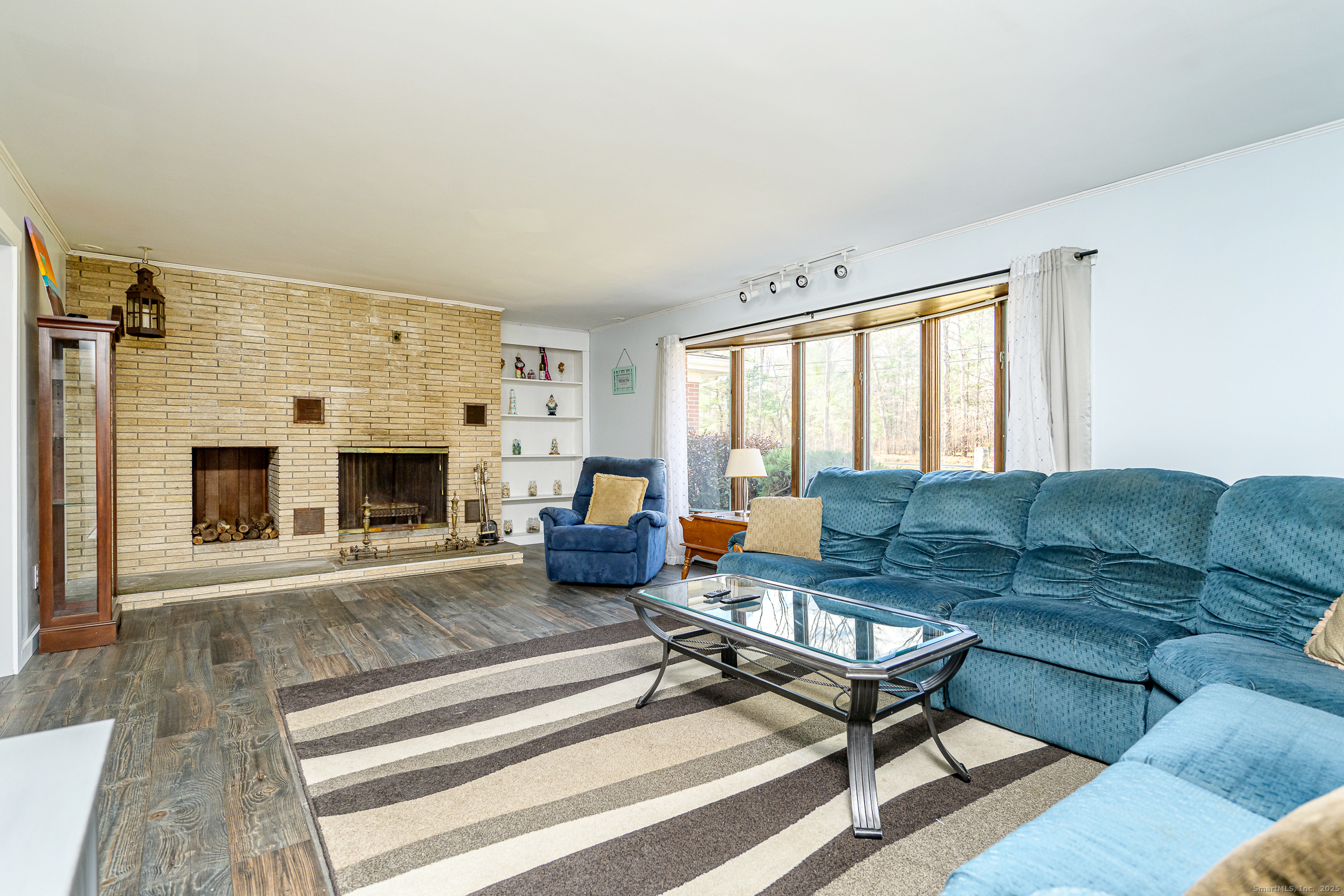 1436 North Road Killingly, CT 06241 - Photo 7 of 36 a living room with furniture and a fireplace