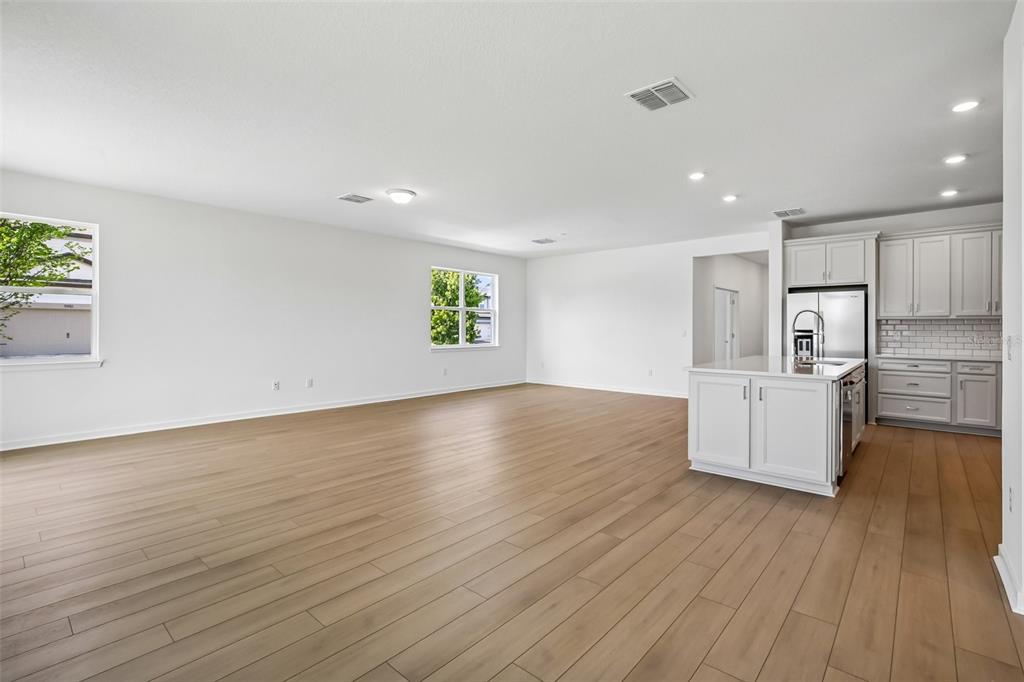 9932 Redwood Rdg Avenue Riverview, FL 33578 - Photo 11 of 38 a view of kitchen and wooden floor