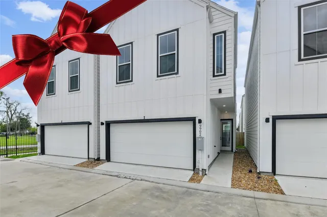 a view of a house with a garage