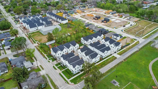an aerial view of a house with a garden