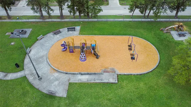 an aerial view of a swimming pool and outdoor space