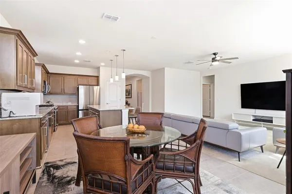 a view of a dining room with furniture