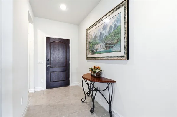 a dining room with furniture and windows