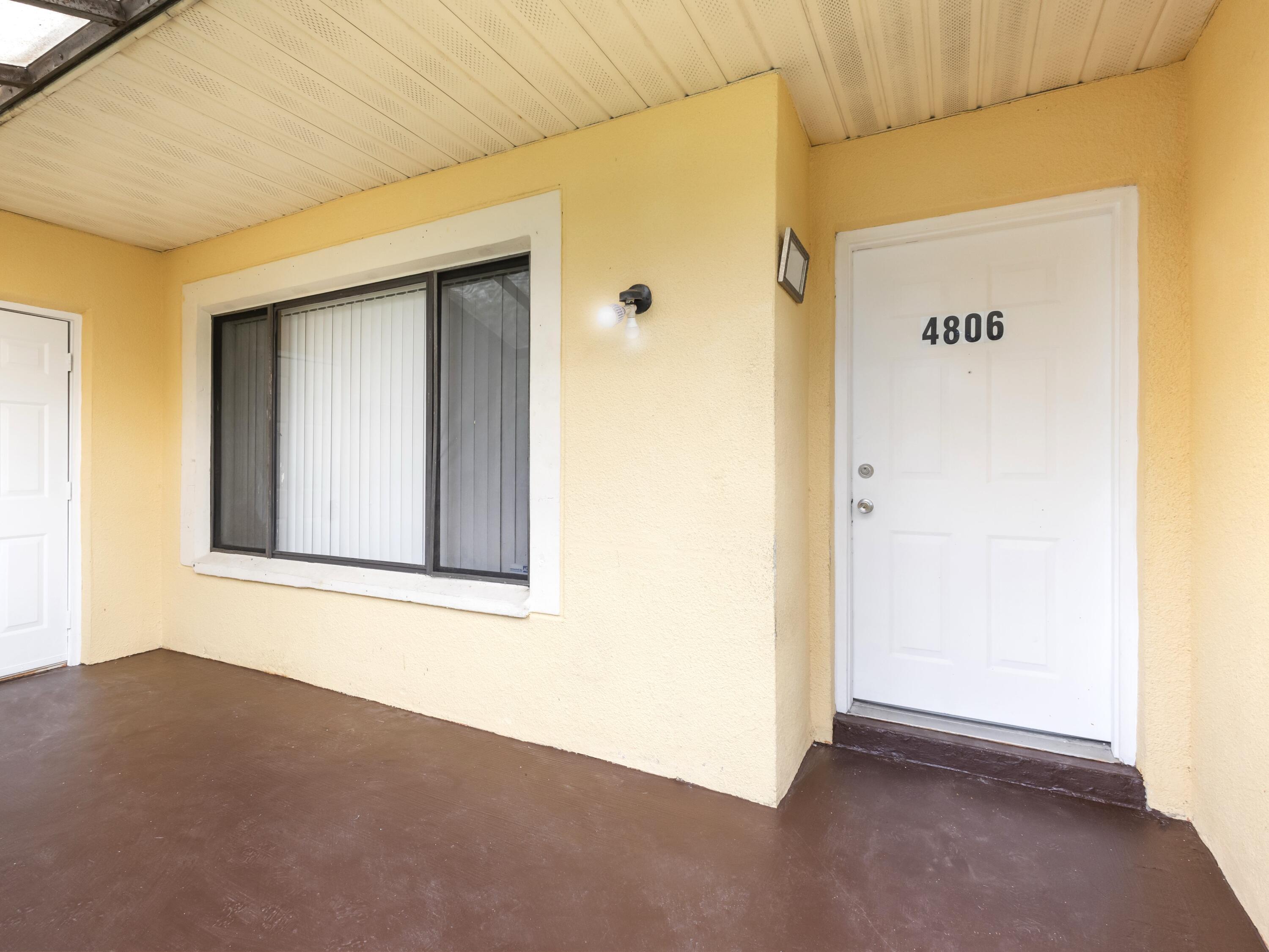 4806 Cherry Road West Palm Beach, FL 33417 - Photo 6 of 28 Entry Screened Porch