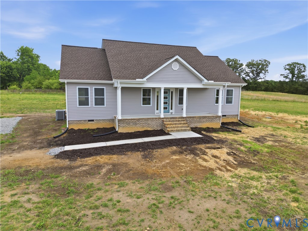 7839 King William Road Aylett, VA 23009 - Photo 2 of 38 a front view of a house with a yard