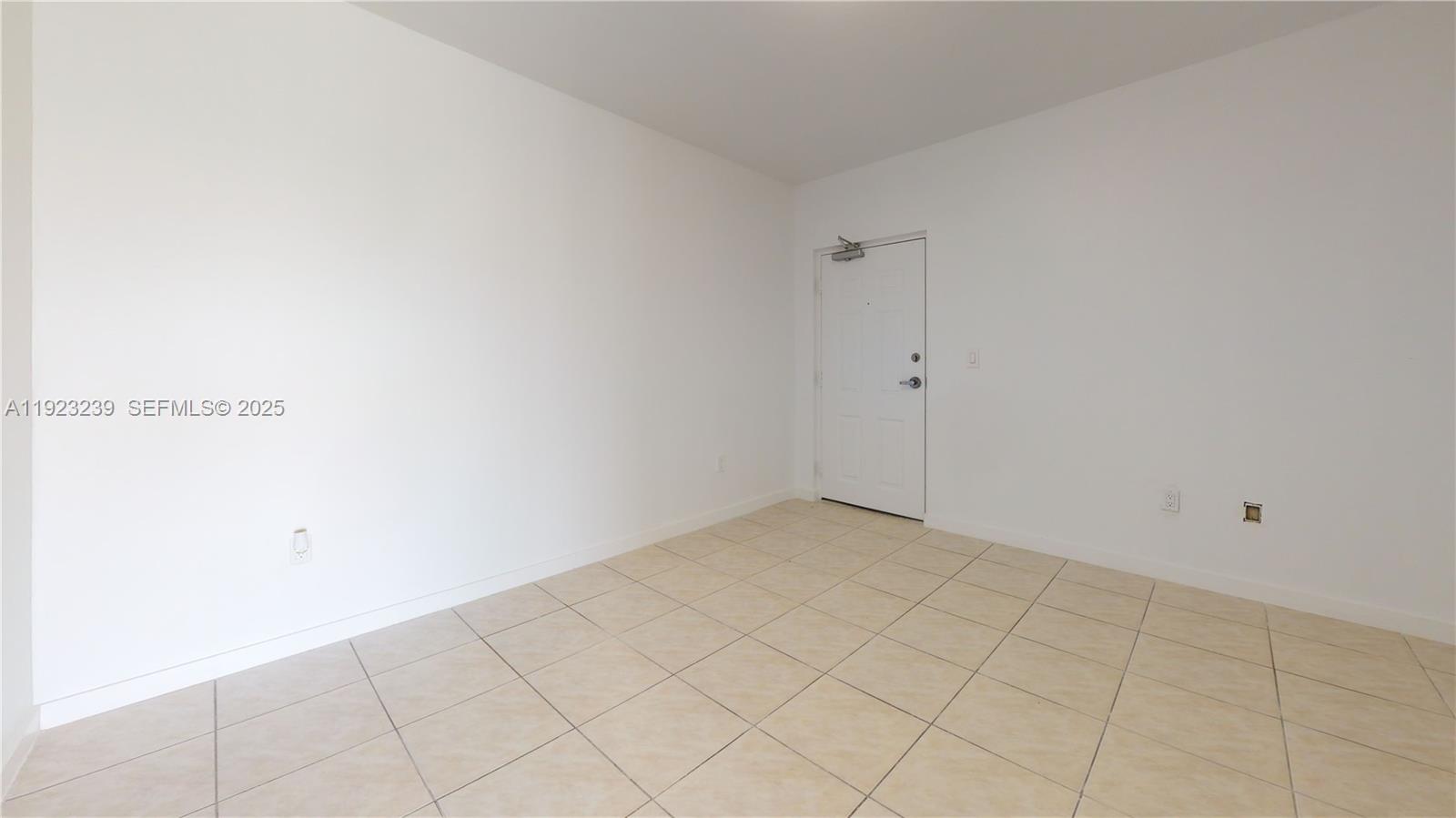 115 Southwest 42nd Avenue, Unit 501 Miami, FL 33134 - Photo 5 of 12 a view of an empty room