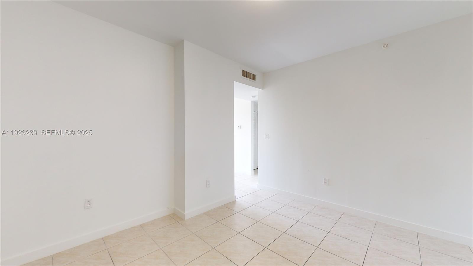 115 Southwest 42nd Avenue, Unit 501 Miami, FL 33134 - Photo 6 of 12 a view of an empty room