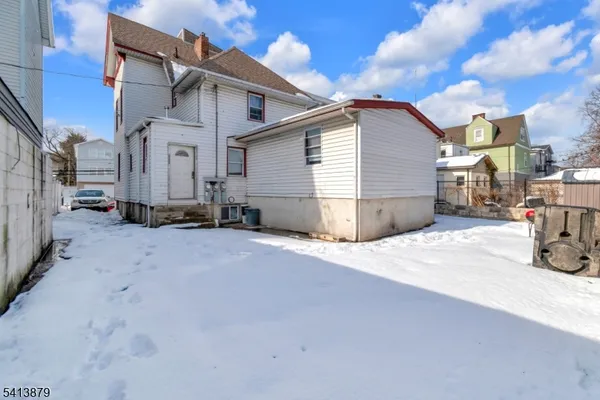 a view of a street with a building
