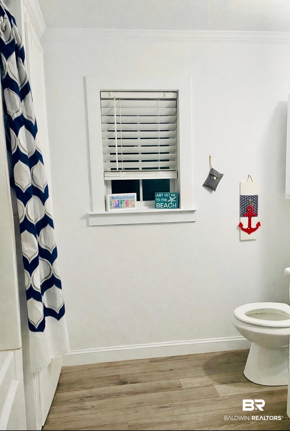 32465 Jay Kee Lane Elberta, AL 36530 - Photo 14 of 17 Full bathroom featuring wood finished floors and crown molding