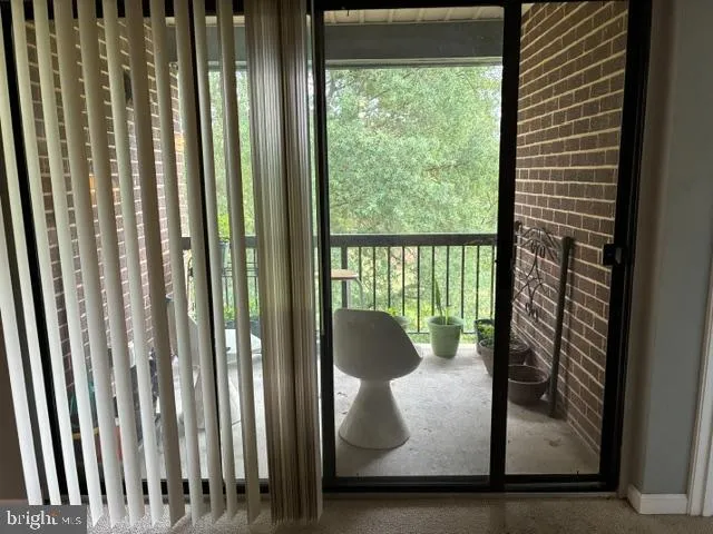 a view of balcony and chair