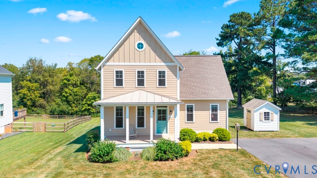 View of front of house featuring board and batten