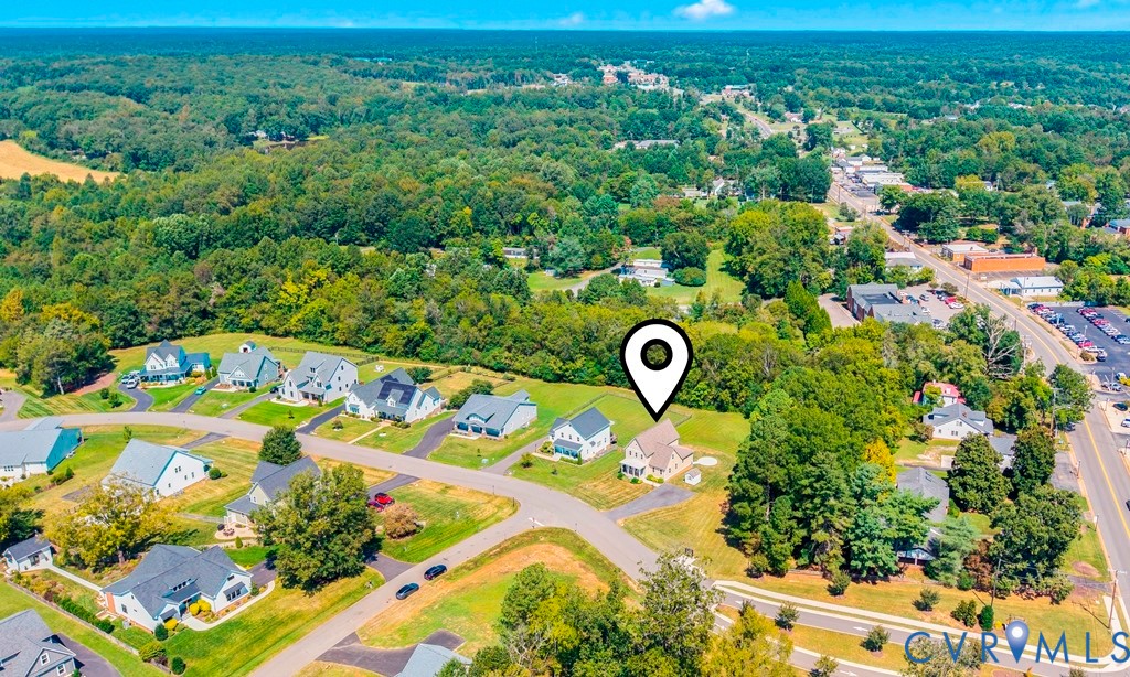 3029 Swanns Inn Crescent Goochland, VA 23063 - Photo 6 of 19 Aerial view of residential area with a forest