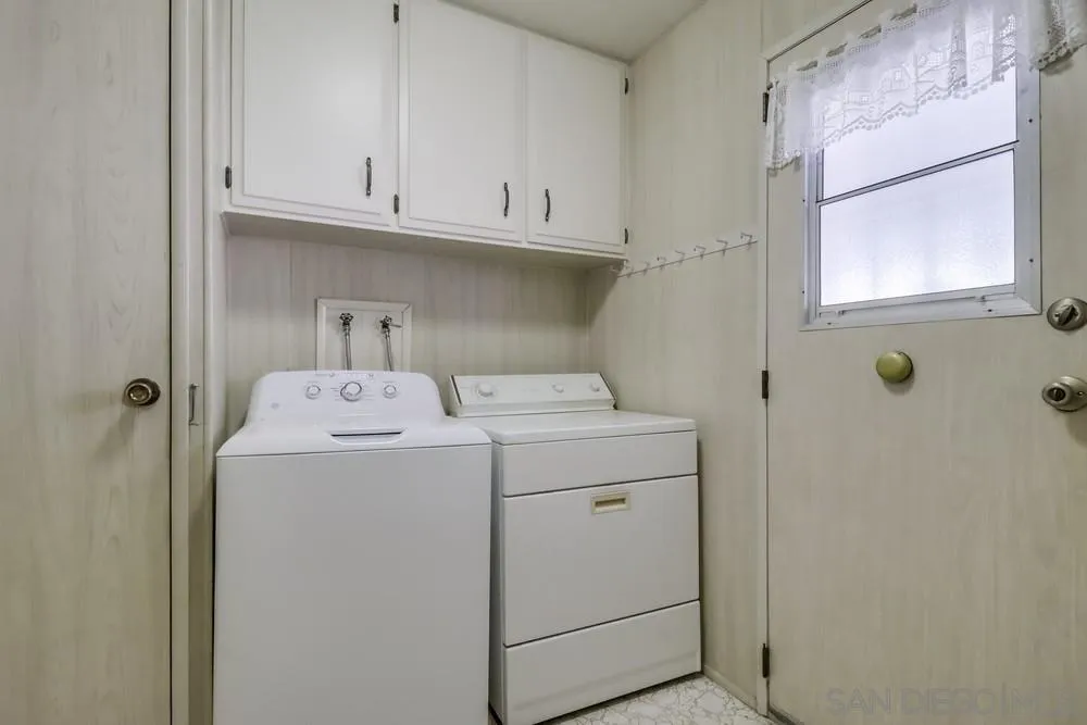 18218 Paradise Mountain Road, Unit 129 Valley Center, CA 92082 - Photo 19 of 58 a utility room with dryer and washer