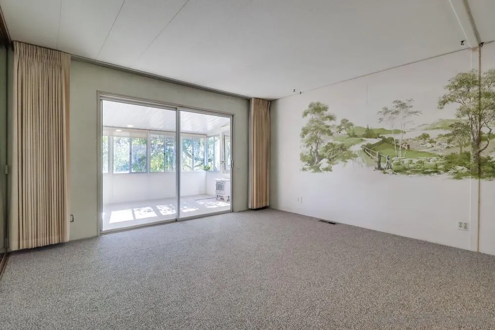 18218 Paradise Mountain Road, Unit 129 Valley Center, CA 92082 - Photo 25 of 58 an empty room with windows