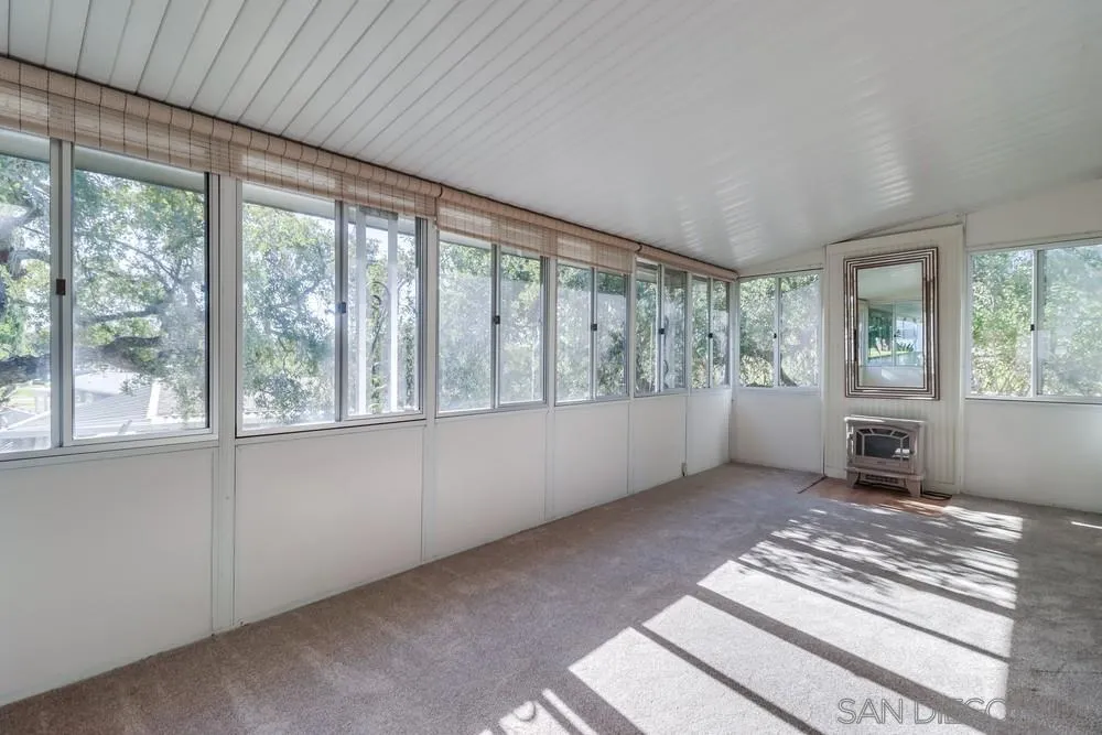 18218 Paradise Mountain Road, Unit 129 Valley Center, CA 92082 - Photo 33 of 58 a view of an empty room with a window