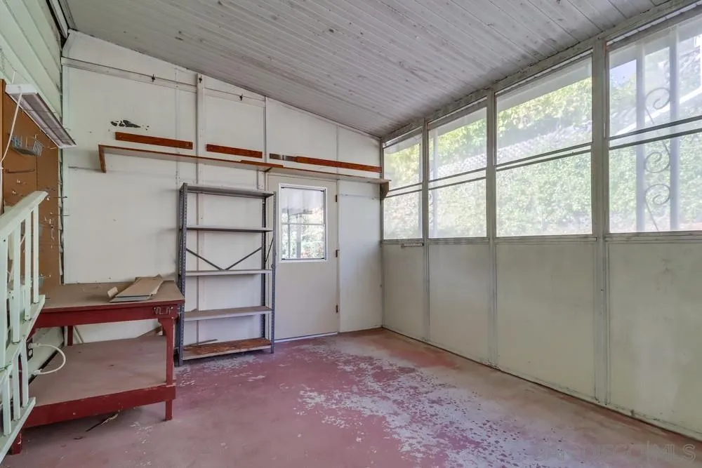 18218 Paradise Mountain Road, Unit 129 Valley Center, CA 92082 - Photo 37 of 58 a view of room with window and cabinet