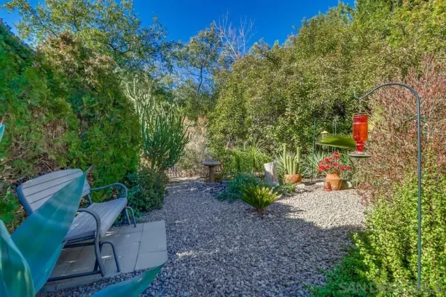 a view of a backyard with a garden