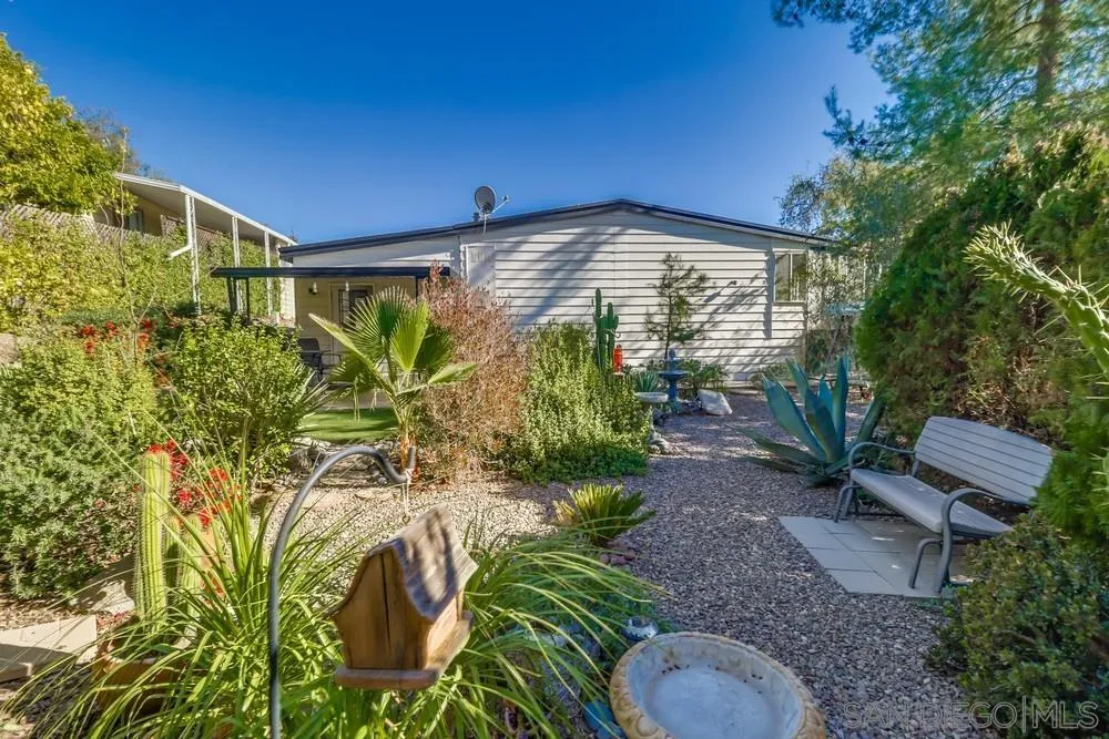 18218 Paradise Mountain Road, Unit 129 Valley Center, CA 92082 - Photo 43 of 58 a view of a backyard