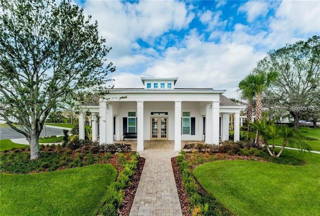 7241 Sunny Meadow Windermere, FL 34786 - Photo 13 of 14 a view of a house with garden and plants