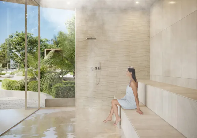 an empty room with closet and windows