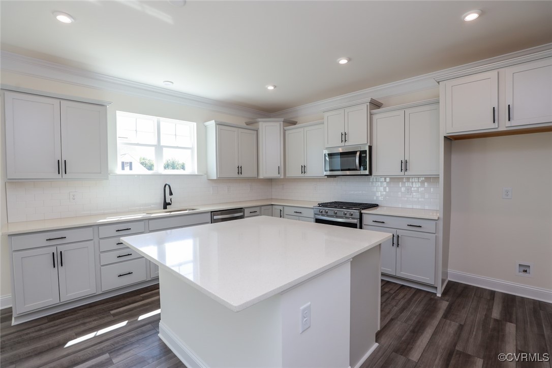 7075 Shining Armor Lane Henrico, VA 23231 - Photo 9 of 49 Kitchen features granite countertops, island, walk