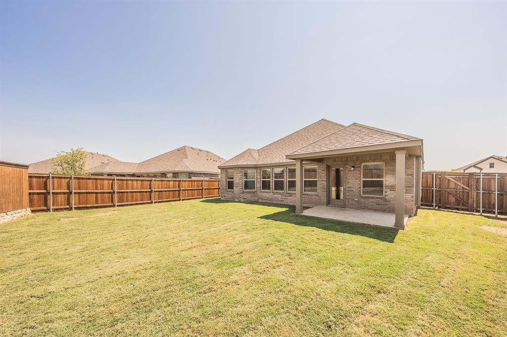 2727 Rambling Road Celina, TX 75009 - Photo 34 of 40 a view of swimming pool with lawn chairs and large trees