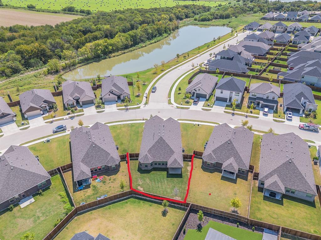 2727 Rambling Road Celina, TX 75009 - Photo 38 of 40 an aerial view of a swimming pool with outdoor seating and yard