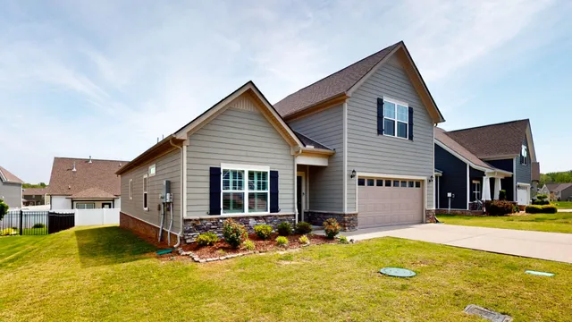 a view of a house with swimming pool