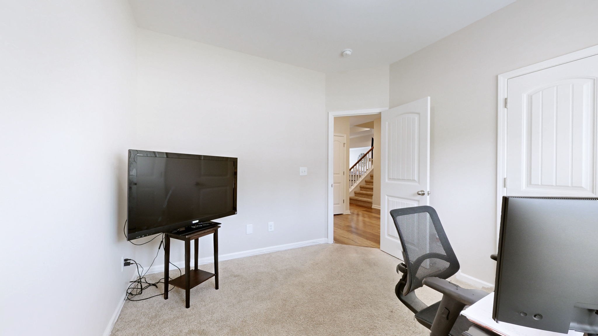1047 Brayden Drive Fairview, TN 37062 - Photo 19 of 31 a living room with furniture and a flat screen tv