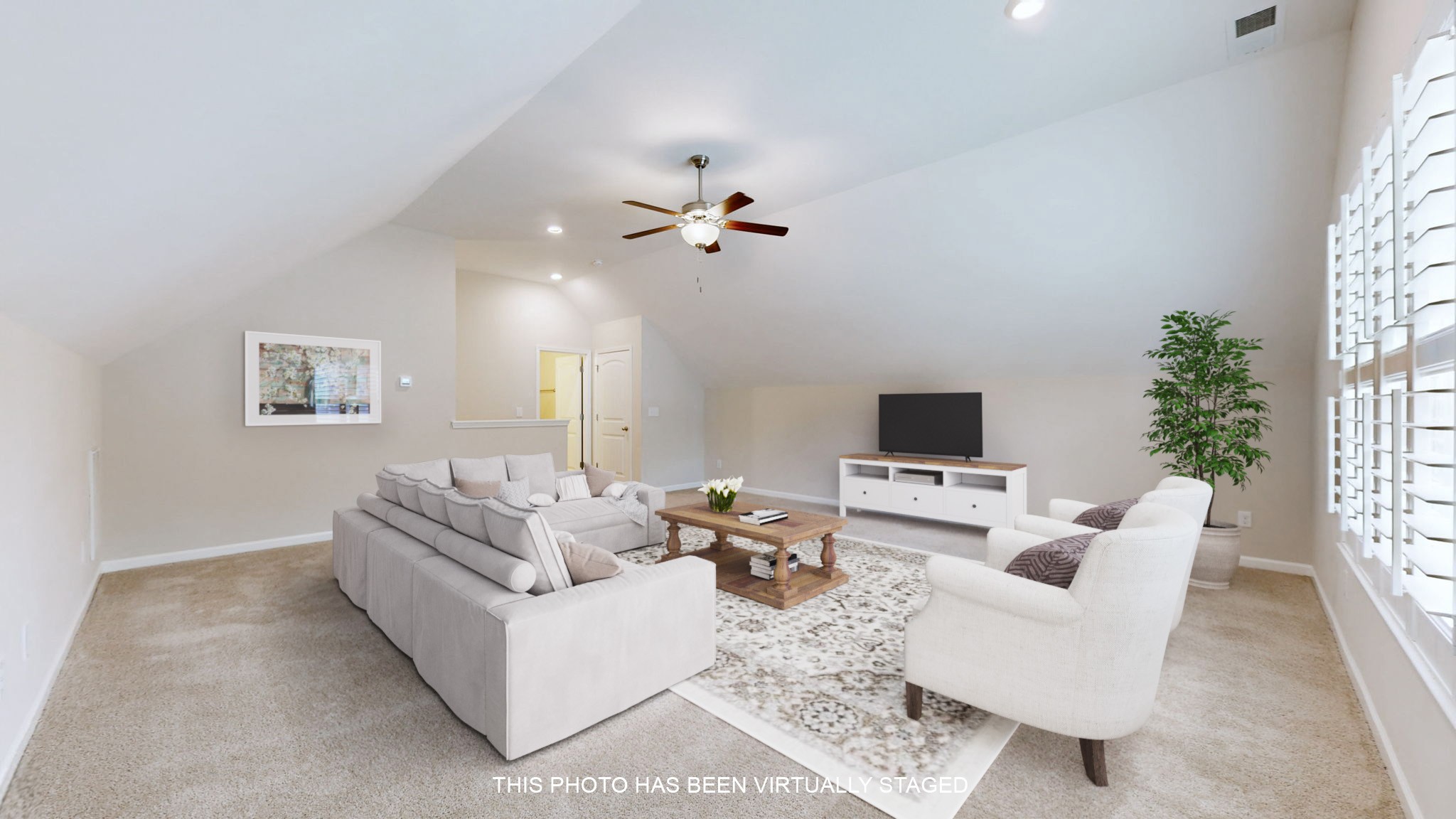 1047 Brayden Drive Fairview, TN 37062 - Photo 20 of 31 a living room with furniture a flat screen tv and a large window