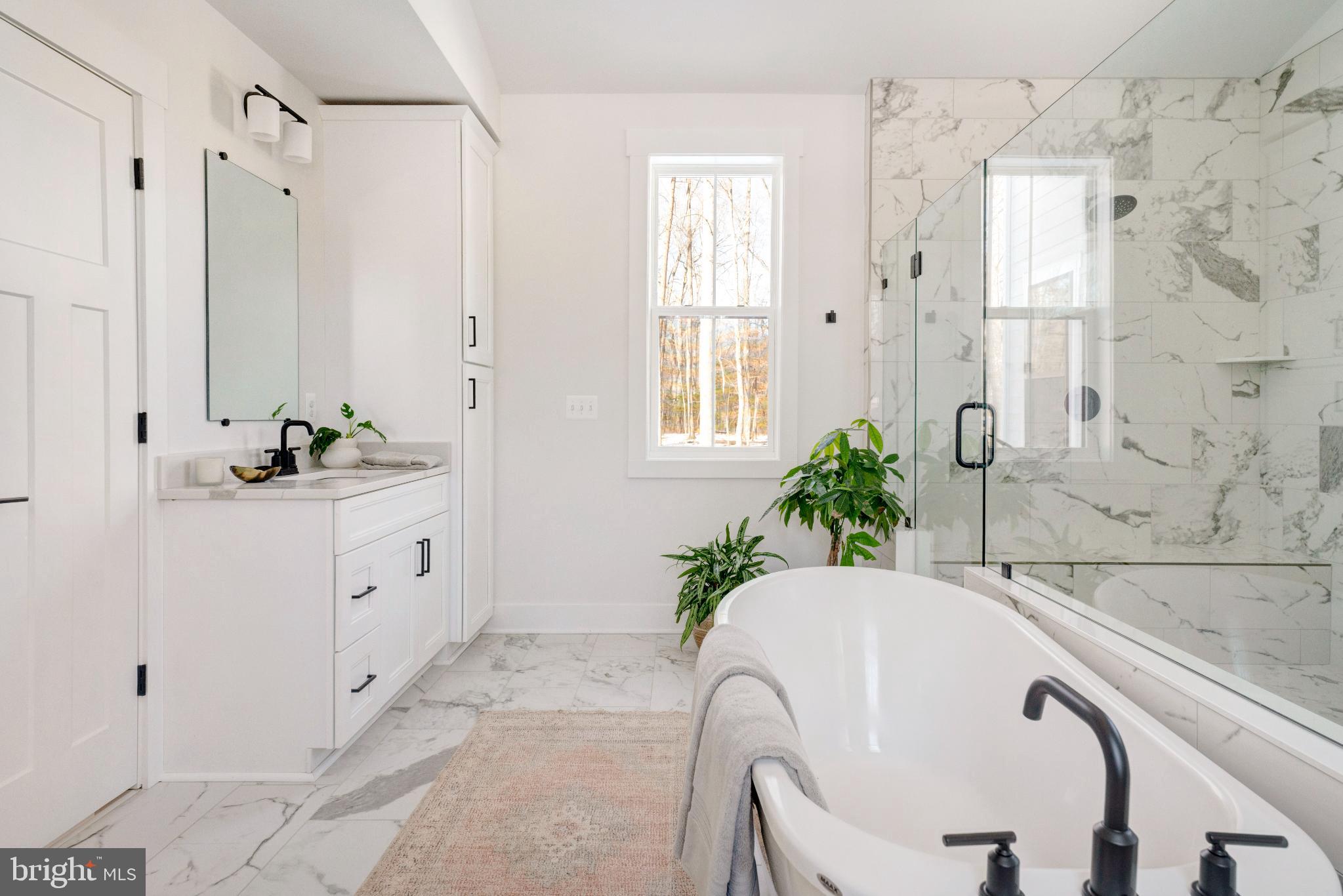 7616 Talbot Run Road Mount Airy, MD 21771 - Photo 16 of 17 Serene modern bathroom with natural light.