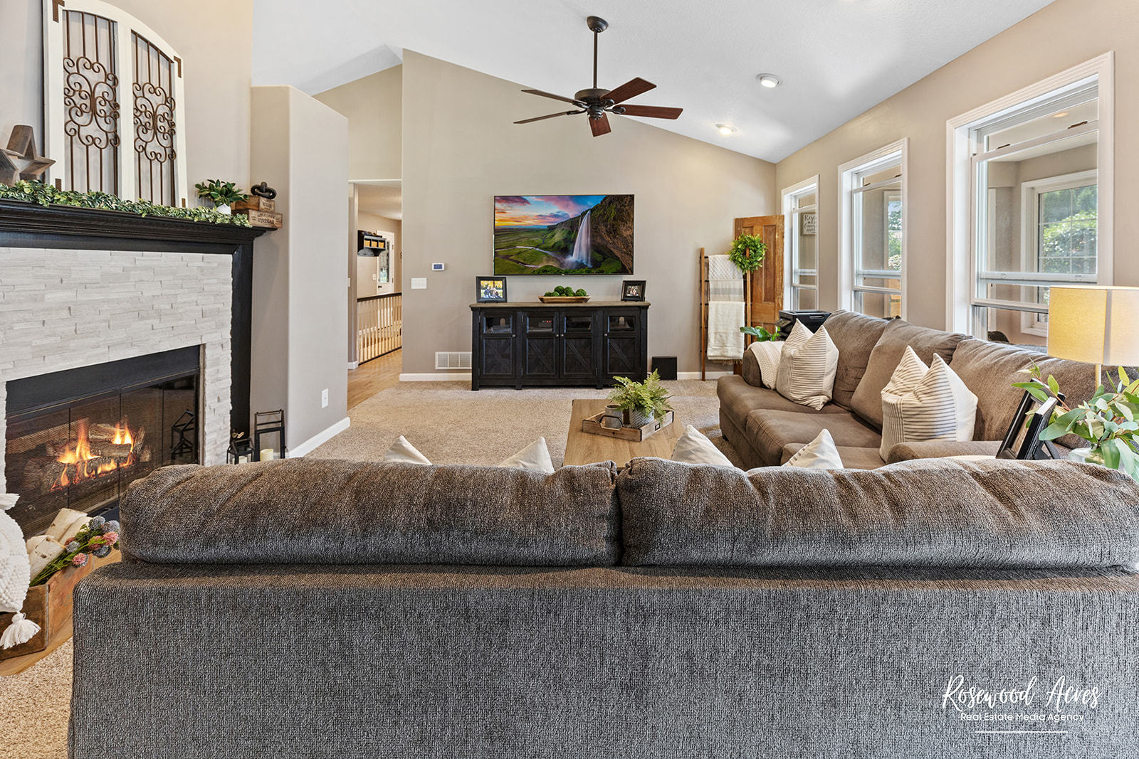 2650 Mooregate Turn Kankakee, IL 60901 - Photo 17 of 51 a living room with furniture a fireplace and a flat screen tv