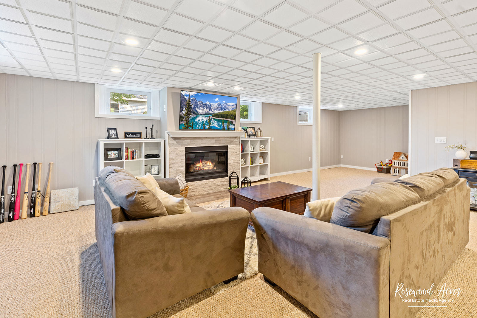 2650 Mooregate Turn Kankakee, IL 60901 - Photo 32 of 51 a living room with furniture a flat screen tv and a fireplace