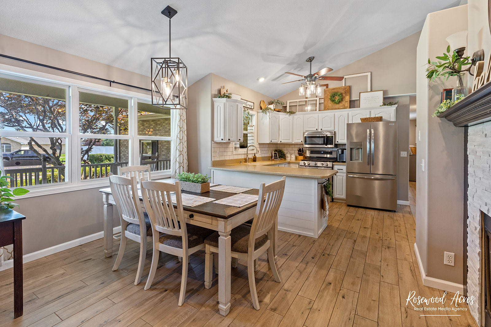 2650 Mooregate Turn Kankakee, IL 60901 - Photo 10 of 51 a kitchen with stainless steel appliances a dining table chairs and wooden floor
