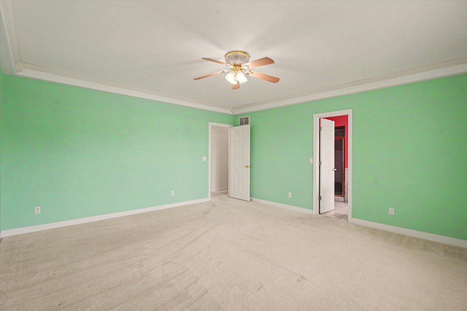2910 Rutherford Drive Urbana, IL 61802 - Photo 24 of 62 a view of an empty room with window and chandelier fan
