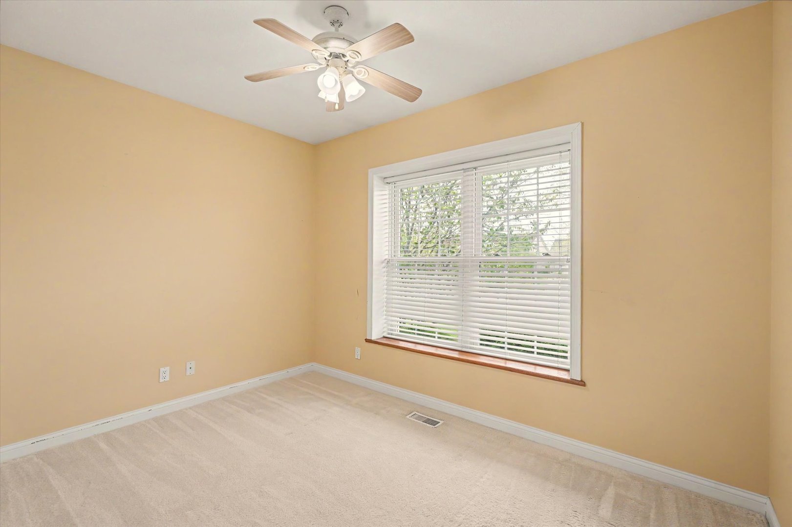 2910 Rutherford Drive Urbana, IL 61802 - Photo 29 of 62 a view of an empty room with a window