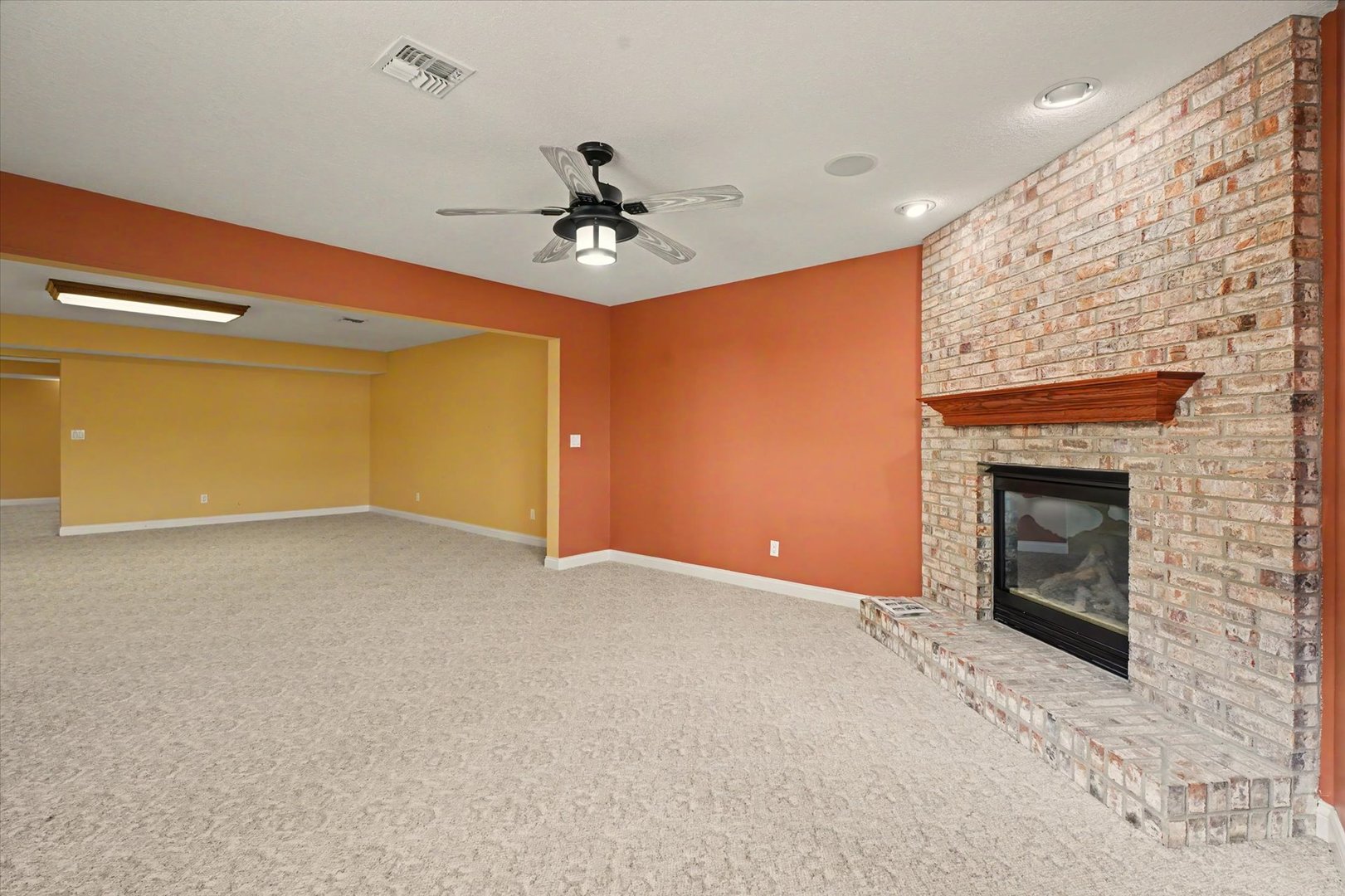 2910 Rutherford Drive Urbana, IL 61802 - Photo 38 of 62 a view of empty room with a fireplace and fan