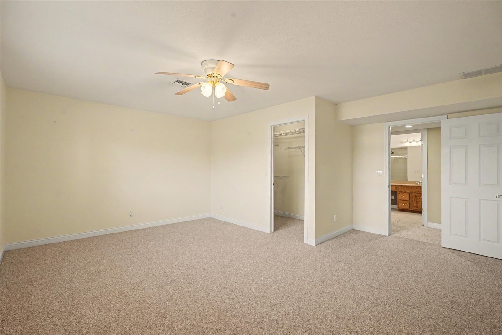 2910 Rutherford Drive Urbana, IL 61802 - Photo 43 of 62 an empty room with a empty space and a ceiling fan