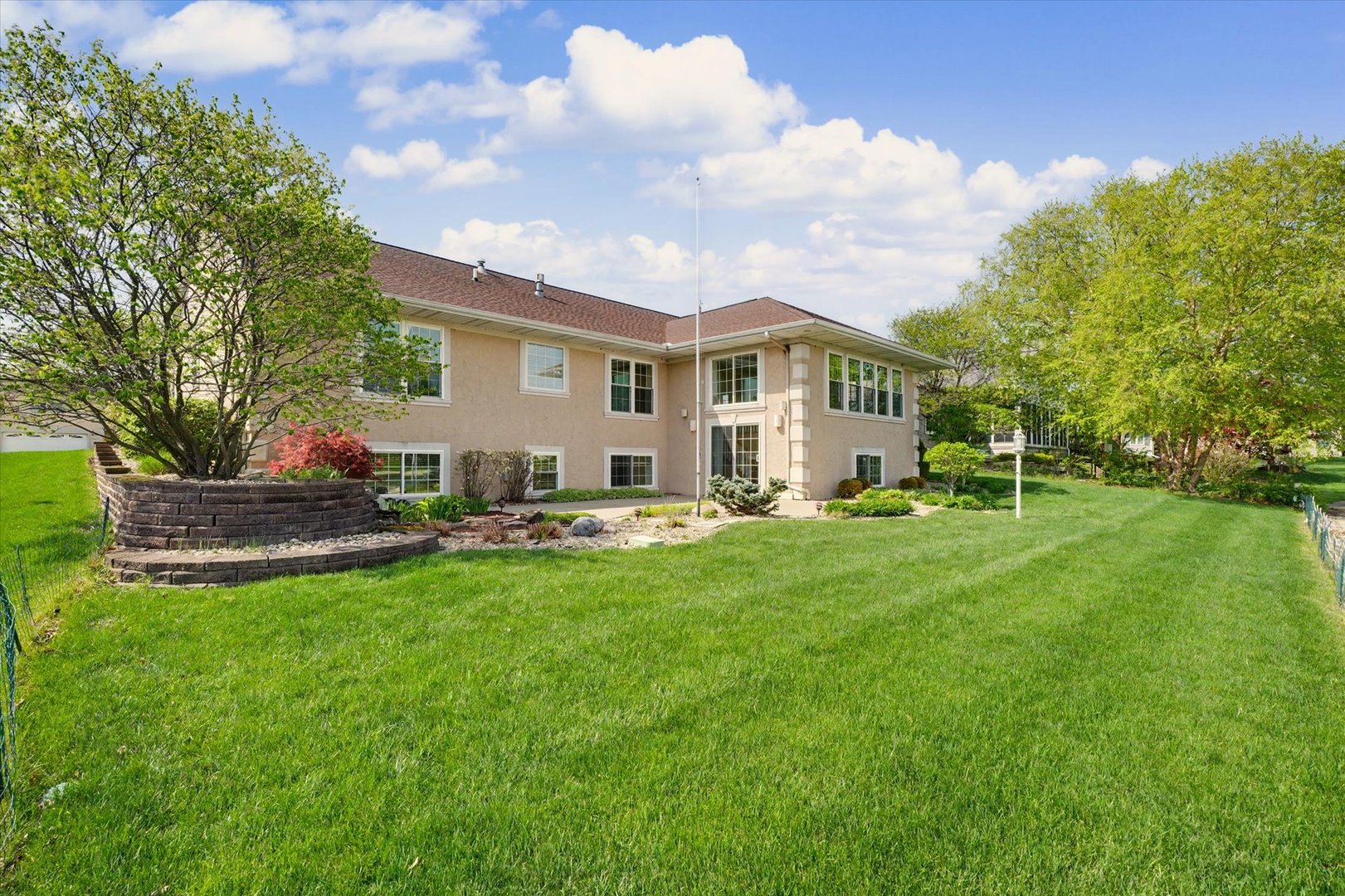 2910 Rutherford Drive Urbana, IL 61802 - Photo 50 of 62 a view of a house with backyard sitting area and garden