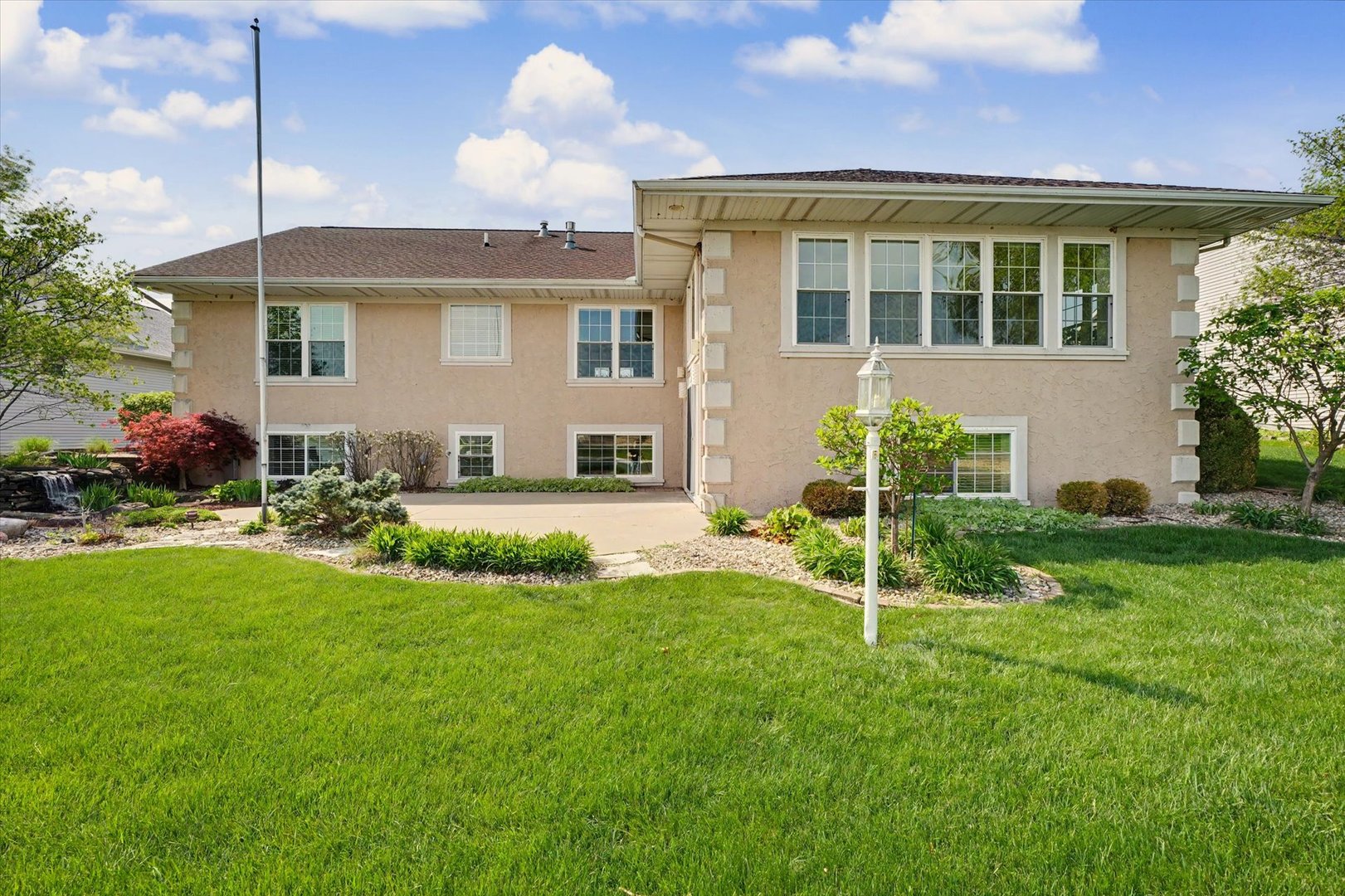 2910 Rutherford Drive Urbana, IL 61802 - Photo 54 of 62 a view of a house with a backyard