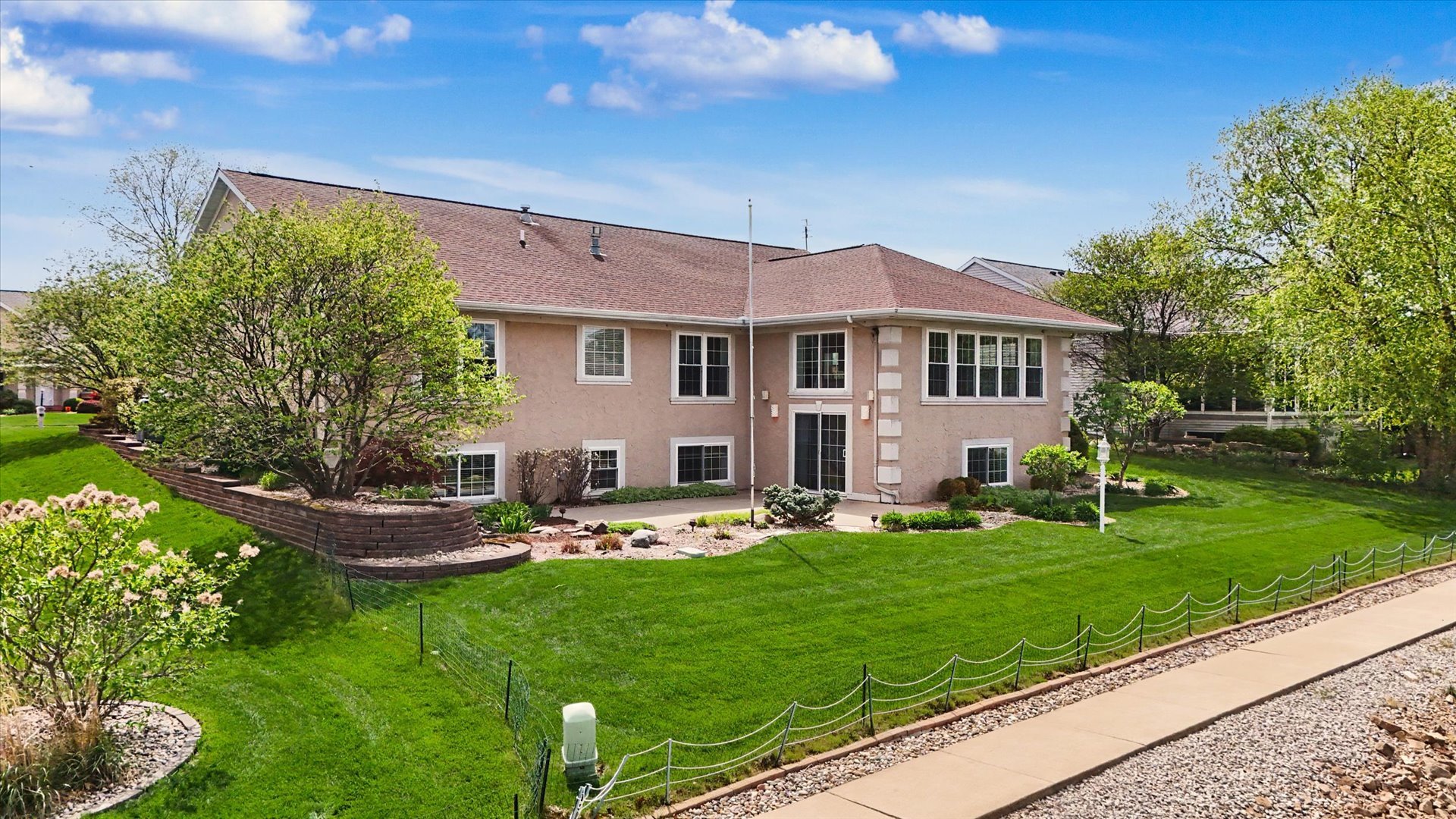 2910 Rutherford Drive Urbana, IL 61802 - Photo 55 of 62 a front view of house with a garden and patio