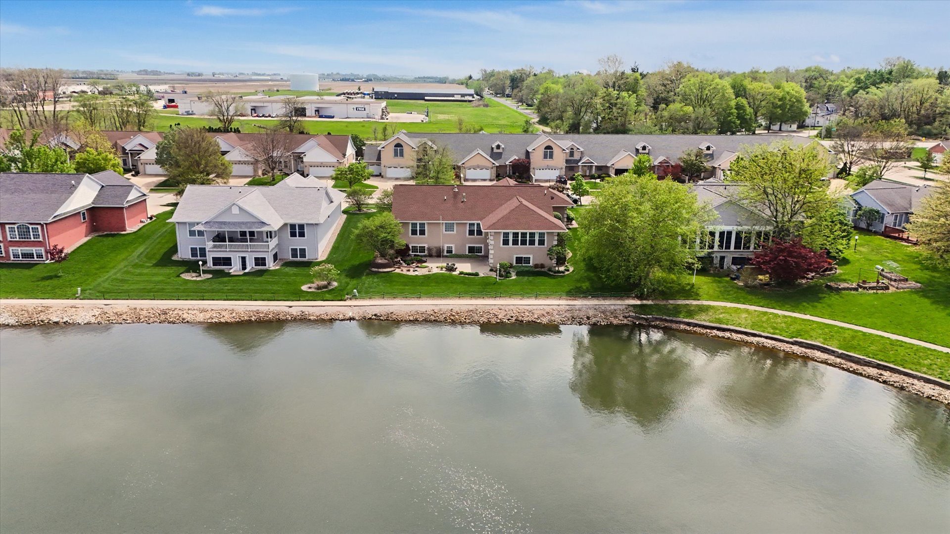 2910 Rutherford Drive Urbana, IL 61802 - Photo 61 of 62 an aerial view of a house with a garden and lake view