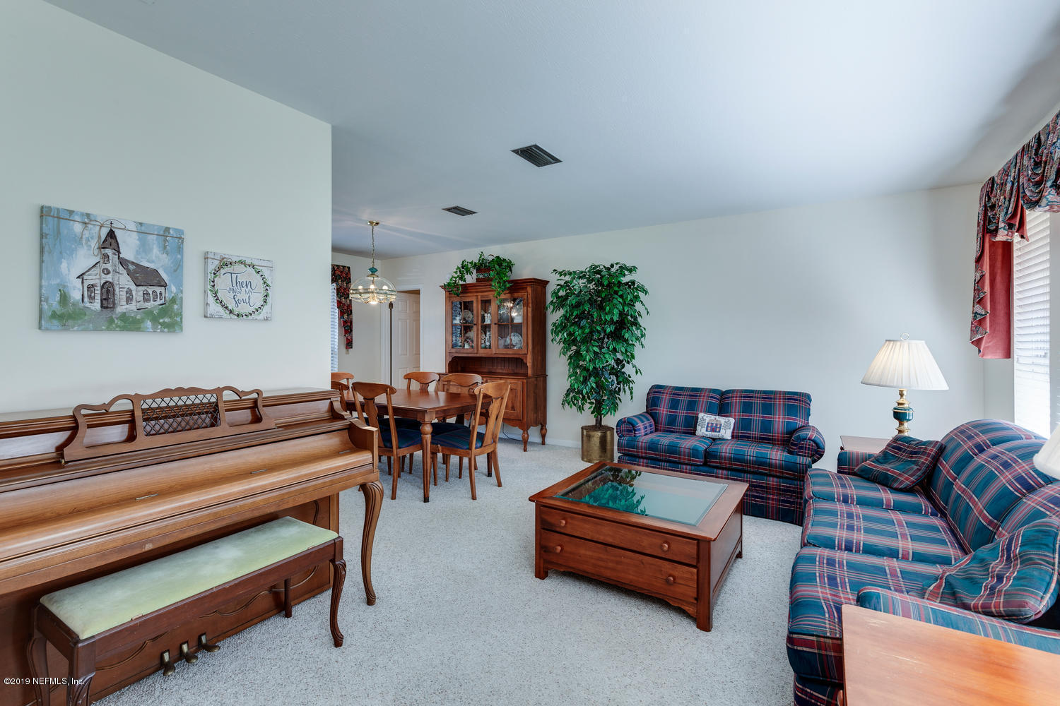 5805 Swamp Fox Road Jacksonville, FL 32210 - Photo 7 of 32 Swamp Fox Rd Liv Rm - Din Rm