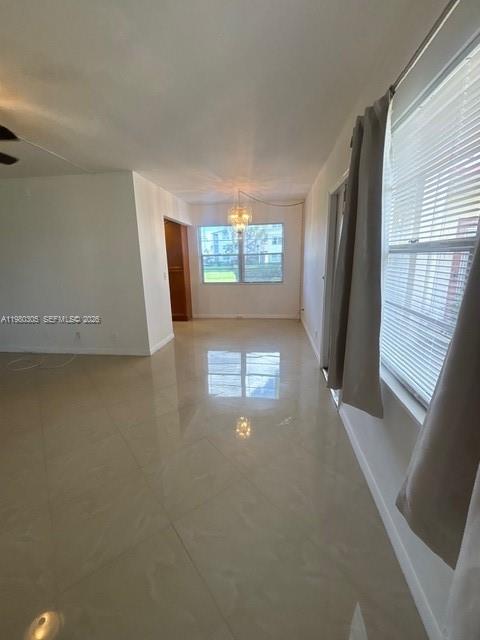 305 Preston F, Unit H Boca Raton, FL 33434 - Photo 16 of 17 an entryway of a room with windows