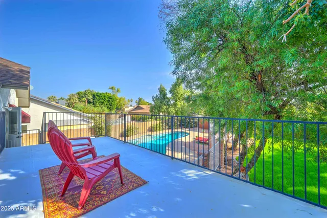 a view of a chairs and table in the terrace