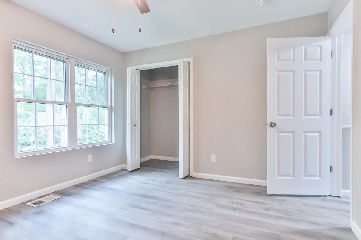 205 Plantation Road Myrtle Beach, SC 29588 - Photo 11 of 35 Unfurnished bedroom featuring ceiling fan, a close
