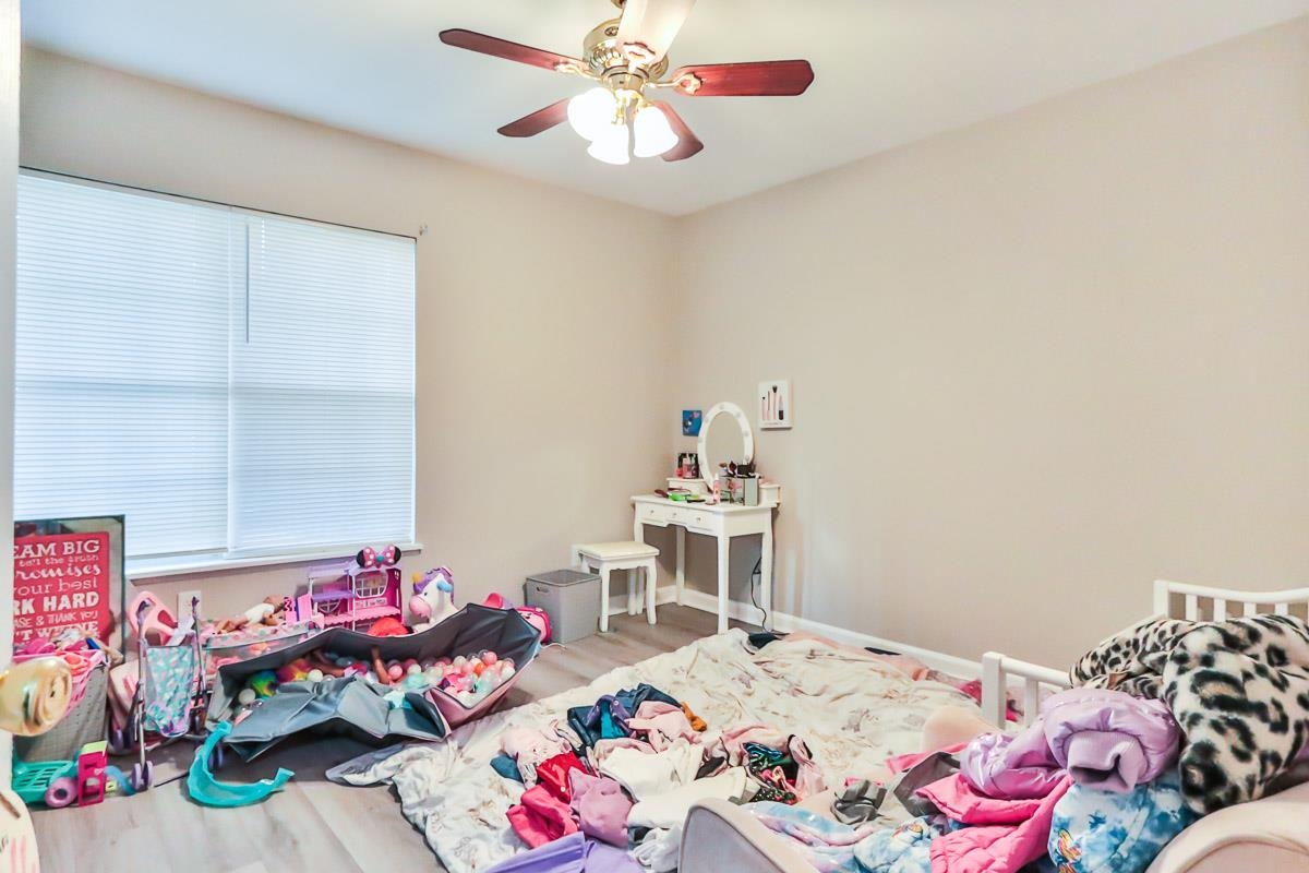 205 Plantation Road Myrtle Beach, SC 29588 - Photo 25 of 35 Bedroom with ceiling fan and hardwood / wood-style
