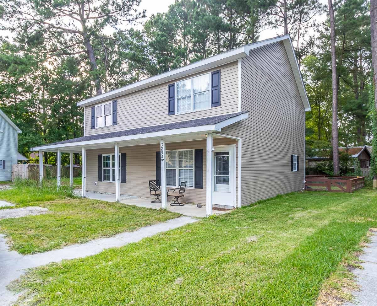 205 Plantation Road Myrtle Beach, SC 29588 - Photo 35 of 35 View of front of house with a front lawn and a por